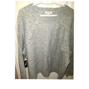 So soft Women's sweater with tassel detail